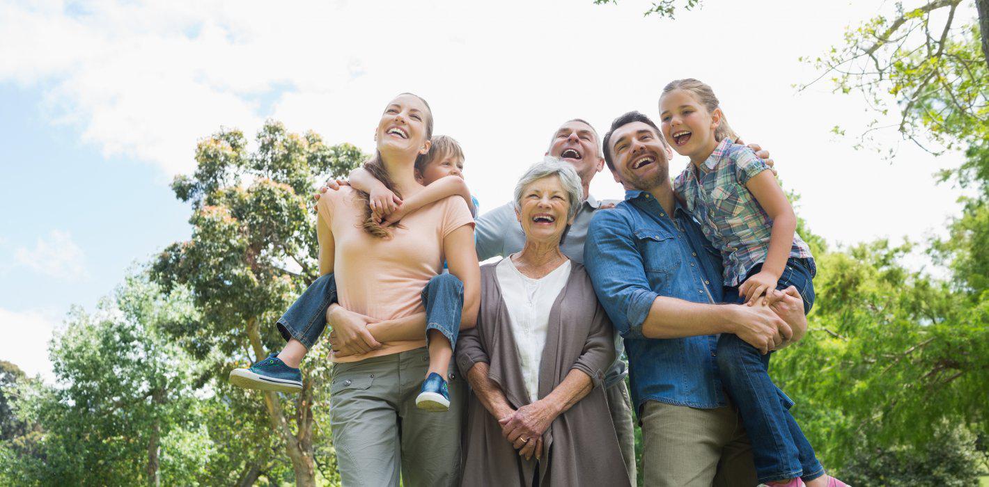 A family outdoors, from grandparents to young children.